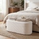 Upholstered oval ottoman bench in beige with corduroy surface, high-density sponge filling, ideal for bedroom or living.