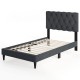 Gray upholstered platform bed with tufted headboard and wooden slats, designed for twin size, no box spring needed.