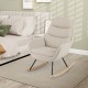 Upholstered rocking chair in beige with padded backrest and armrests, ideal for nurseries and cozy living spaces.