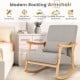 Modern upholstered rocking chair in gray with rubber wood frame, ideal for living rooms and bedrooms for relaxation.