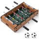 Mini foosball table with 4 steel rods, 12 players, and 2 soccer balls for home, office, or party fun.