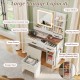 Vanity desk with mirror and lights, featuring ample storage, a charging station, and a stylish white finish for makeup.