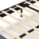 Close-up of wooden slats on a velvet upholstered platform bed frame with adjustable headboard for enhanced support.