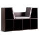 Cushioned reading nook with 6 cubbies for storage, made from durable brown particle board, ideal for kids' rooms.