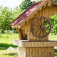 Decorative vintage wood wagon wheel made of Chinese fir, featuring a retro design, ideal for gardens and outdoor spaces.