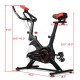 Indoor exercise bike with adjustable seat height, pulse sensor, and phone holder, designed for home workouts.