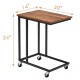 U-shaped mobile side table in brown with a sturdy metal frame and four rubber casters, ideal for use beside a sofa or.