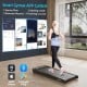 Walking pad in black with remote control, supporting 300 lbs, featuring a 7-layer anti-slip belt for home workouts.