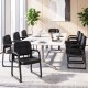 Single black leather office reception chair with cushioned seat and padded armrests, perfect for comfortable waiting.