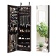 Brown jewelry cabinet with LED lights and velvet liner, showcasing hooks and shelves for organized storage and easy.