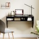Wall-mounted black computer desk with 3 storage compartments, featuring a spacious surface for monitors and laptops.