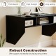 Wall-mounted black computer desk with 3 storage compartments, offering a modern look and sturdy support for laptops.