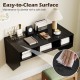 Wall-mounted black computer desk with three storage compartments, featuring an easy-to-clean surface for modern.