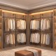 Wall-mounted black clothing rack with 4 hanging rods, featuring a double-tier design for organized storage in any space.
