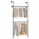 Wall-mounted black clothing rack with two hanging rods, featuring coats and dresses for organized storage in any space.