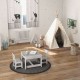 Kids table and chairs set in white with storage boxes, ideal for drawing and play in a children's room.