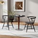 Windsor dining chair set in black with ergonomic backrest, perfect for kitchens and dining rooms.