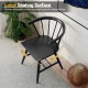 Large black Windsor dining chair with ergonomic backrest and spacious seat, ideal for kitchens and dining rooms.