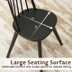Windsor dining chair with large black seat surface, ergonomic spindle back, perfect for dining rooms and cafes.