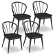 Set of 4 black Windsor dining chairs featuring spindle backrests and rubber wood construction for stable seating.