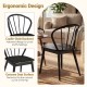 Windsor dining chair with spindle backrest in black, featuring a concave seat and ergonomic design for comfort.