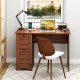 Wooden vintage computer desk in walnut with two side drawers, large surface, and stylish metal knobs for home office.