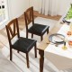 Set of 2 wooden dining chairs with brown rubber wood frame and black PU leather upholstery, perfect for dining areas.