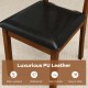 Close-up of a wooden dining chair with luxurious PU leather seat, featuring a brown rubber wood frame for easy cleaning.
