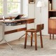 Mid-century modern brown acacia wood dining chair with smooth round corners, ideal for kitchens and dining rooms.