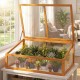 Wood cold frame greenhouse with transparent flip-top roof, featuring fir wood construction for indoor and outdoor plant.