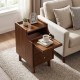 Wood nightstand with pull-out tray, two drawers, and solid wood legs in brown, perfect for bedside storage.
