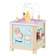 Wooden activity cube with sensory toys, featuring a dessert theme, shape matching blocks, and hidden storage for.
