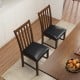 Two wooden dining chairs with padded seats and rubber wood frames in deep brown, perfect for dining rooms or cafes.