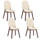 Set of four mid-century modern wooden dining chairs with upholstered seats in cream, perfect for dining or office use.