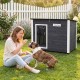 Wooden dog house with a coated spruce frame, openable asphalt roof, and removable floor for easy cleaning and comfort.