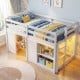 Wooden low kids loft bed in white with LED lights, spacious under-bed area, and ample storage for toys and books.