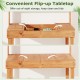 Flip-up tabletop of the wooden potting bench, showcasing hidden storage for tools and a sturdy design for gardening.