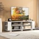 Wooden TV stand with a smooth white finish and eight open shelves, featuring a stylish design for modern living spaces.