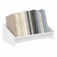 Wooden tilting bookcase in white displaying organized books, perfect for desktop storage and modern home decor.