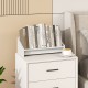 Small white wooden tilting bookshelf organizer displaying books, ideal for desktop use in living room or study.