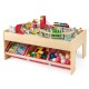 Wooden train set table with reversible tabletops, 94 accessories, and 3 storage drawers for kids' playtime fun.