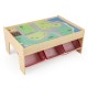 Wooden train set table with reversible tabletops and 3 fabric drawers for kids' toys, promoting creativity and play.