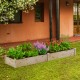 Wooden vegetable raised garden bed showcasing vibrant plants, made of solid fir wood, perfect for outdoor gardening.