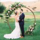 Wooden wedding arch made of natural fir wood, round shape, ideal for outdoor ceremonies and floral decorations.
