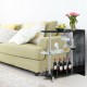 Black 2-holder bar table with tempered glass shelves, ideal for wine storage and enhancing modern interiors.